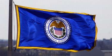 [Federal Reserve Board flag]